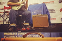Our very own Frank Johns pickin away while using a Milkman amp.